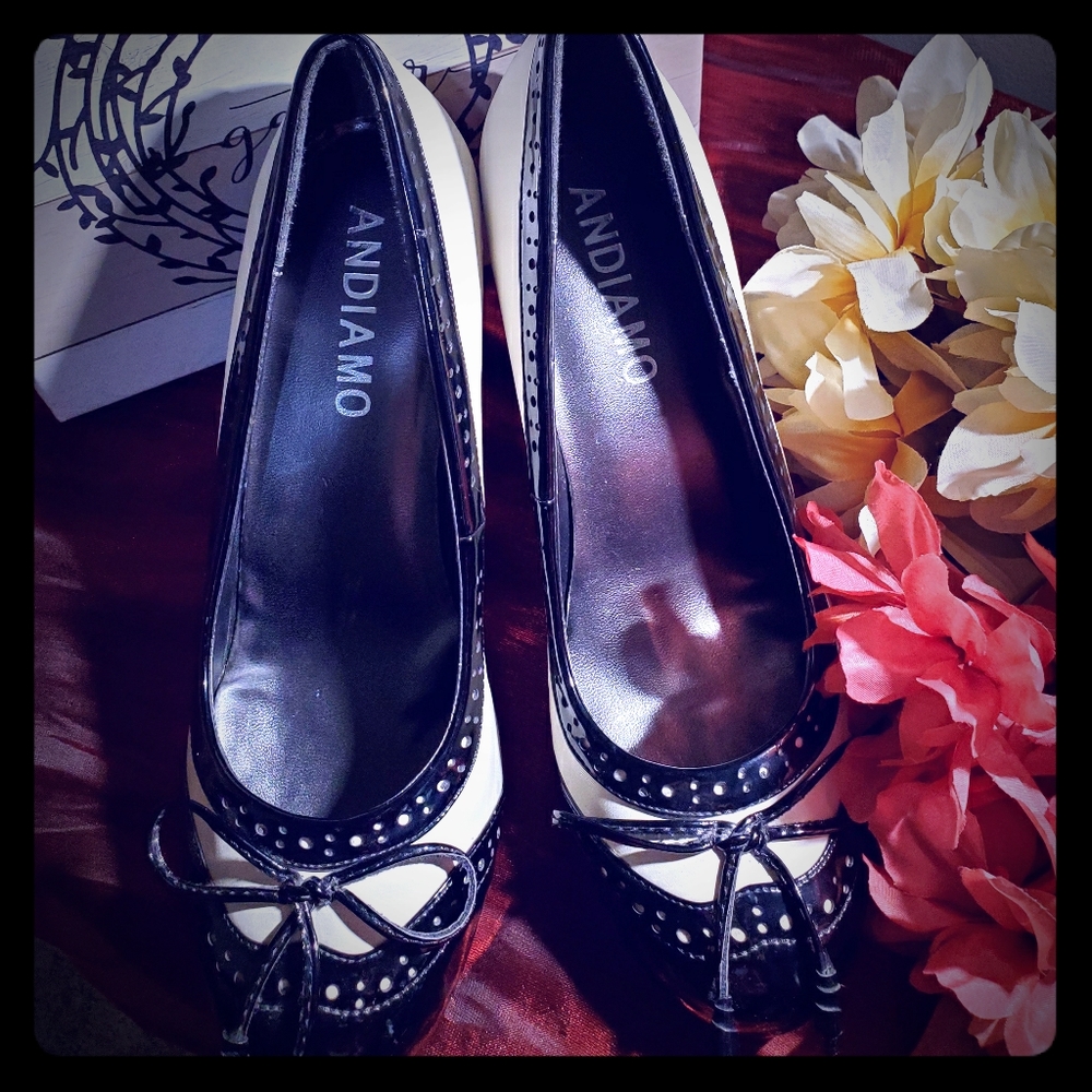 Andiamo Black and White Wingtip Pumps